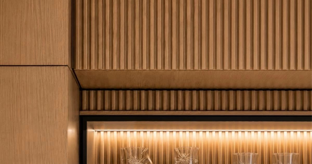 luxury-golf-club-entrance-with-custom-wood-paneling-and-pendant-lighting-barberini-interiors